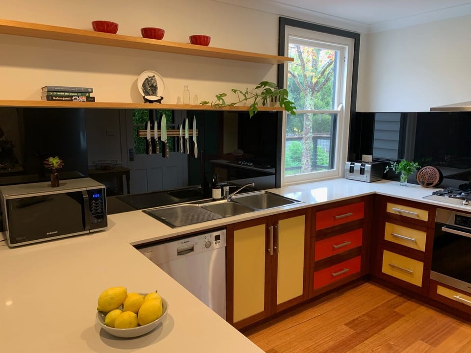 Kitchen has beautiful backyard views