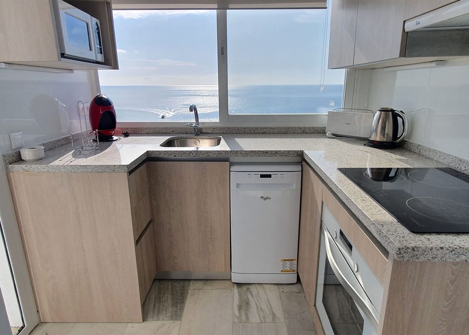 Open kichen with amazing sea views