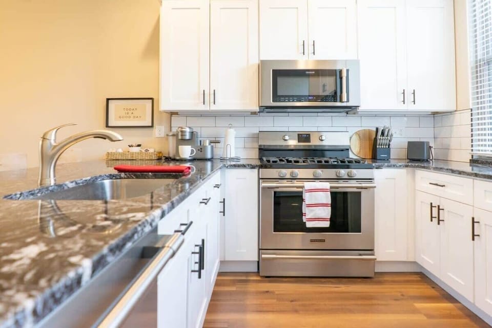 Fully equipped kitchen with modern appliances, ready for anything from simple snacks to full meals. #TravelKitchen #HomeAwayFromHome