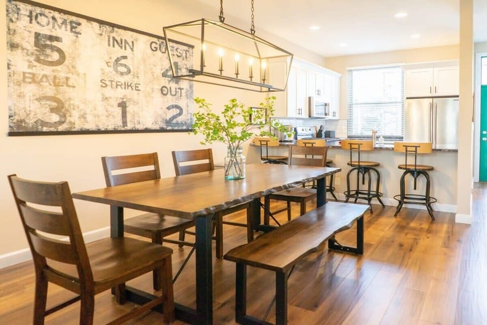 Gather, connect, and linger a little longer. This open dining space flows right into the kitchen, making it perfect for shared meals and easy mornings together. #GroupGetaway #FamilyDining