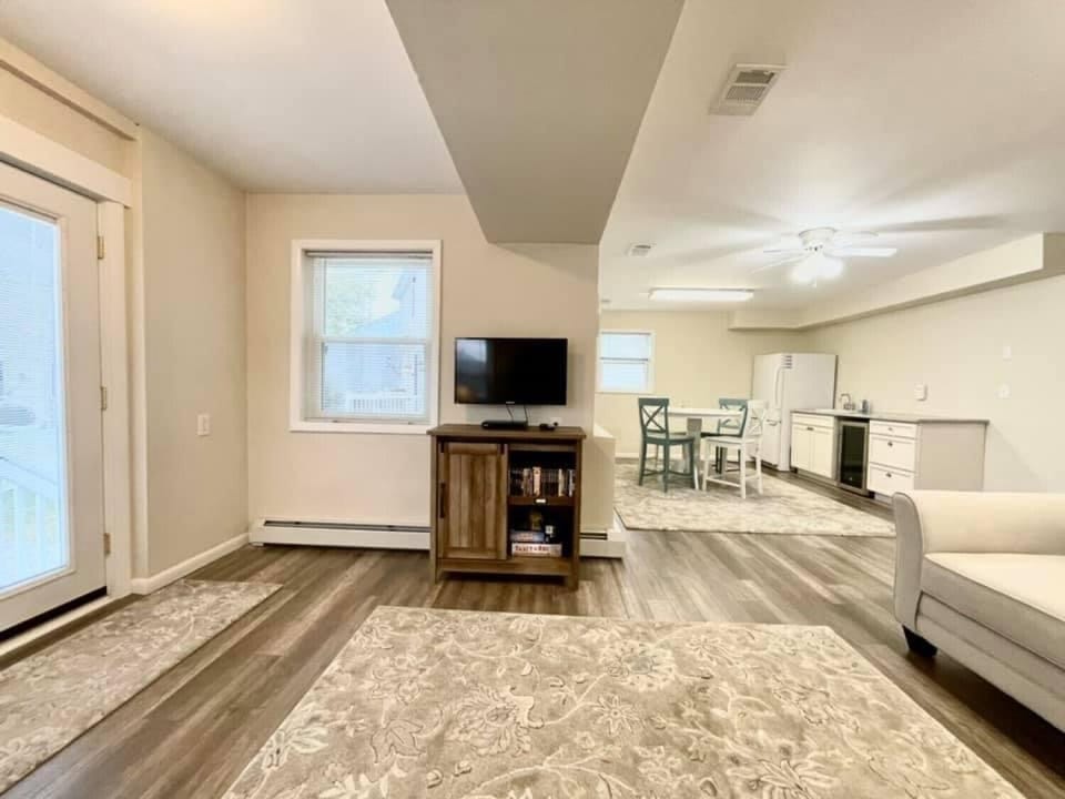 Lower Level Suite has living area, kitchenette, bedroom & bathroom.