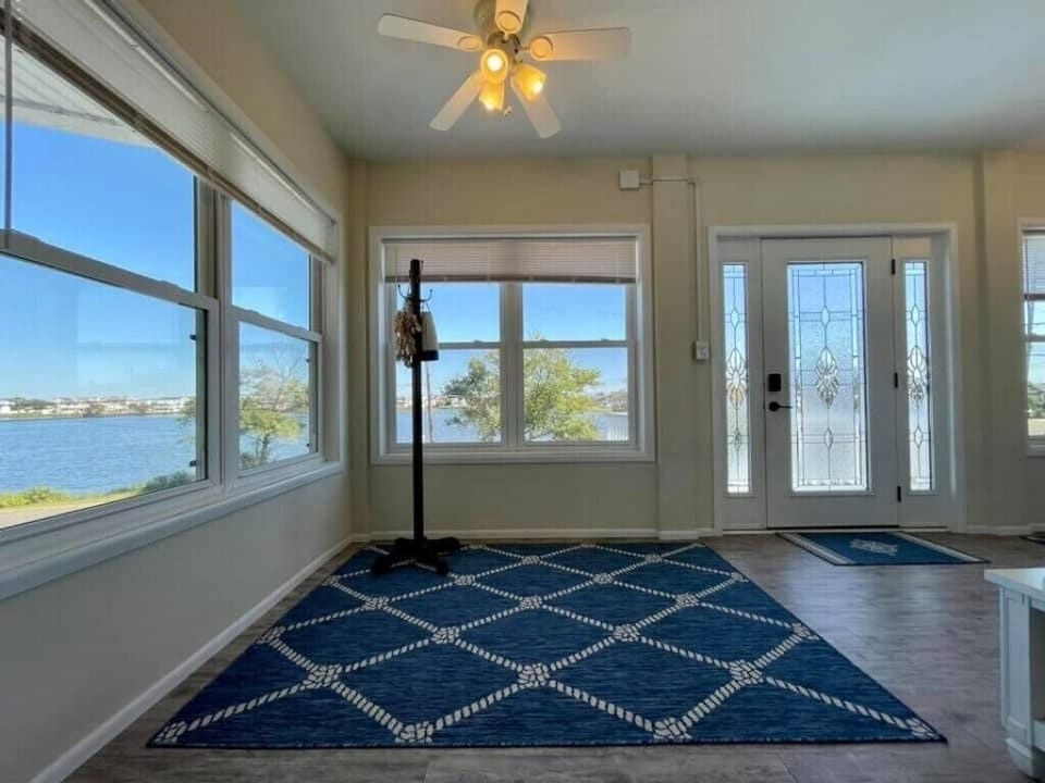 Entry way, like much of house, is light and airy with great views.