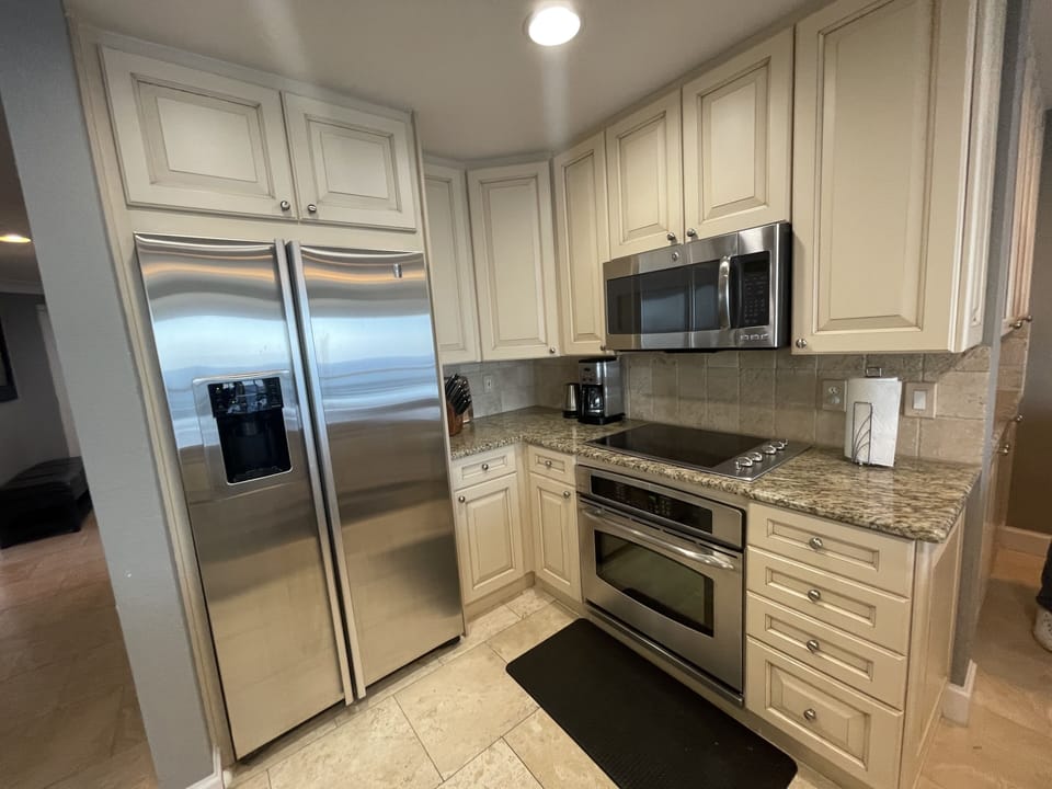 Fully stocked kitchen ,pots pans, dishes, utensils ,coffeemaker  and Keurig