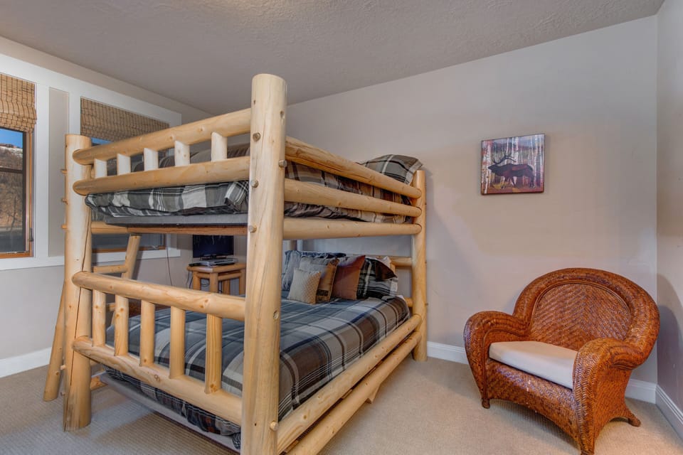 Bedroom 3 with full over full bunkbed, 19" tv with DVD player, and en suite bathroom