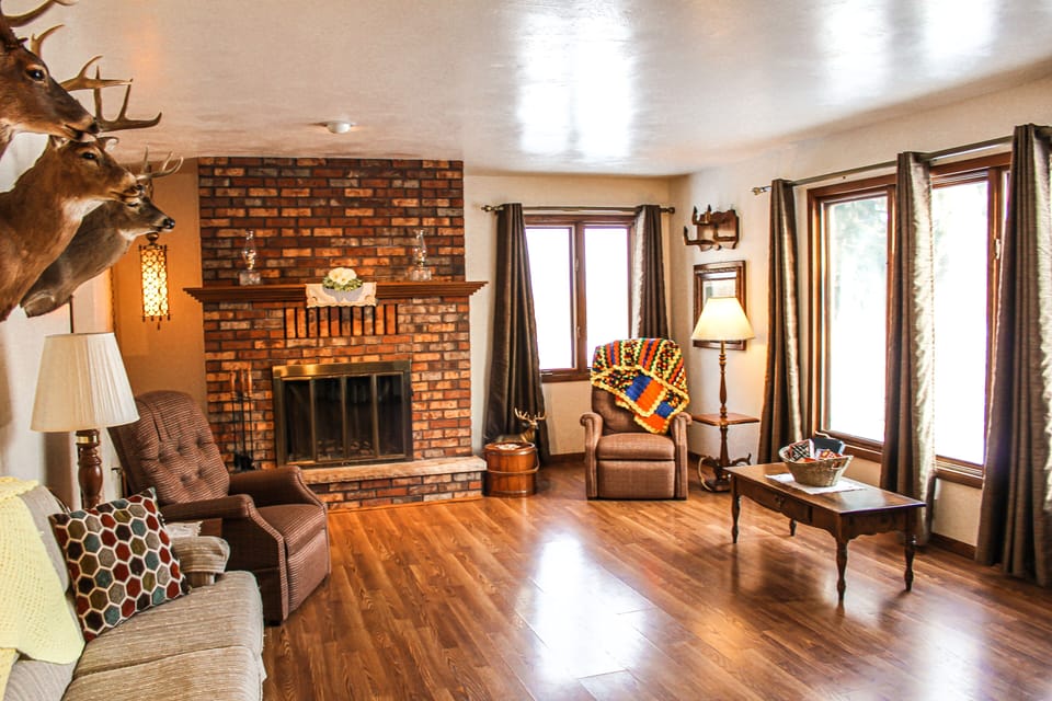 Living Room with large windows overlooking our pond