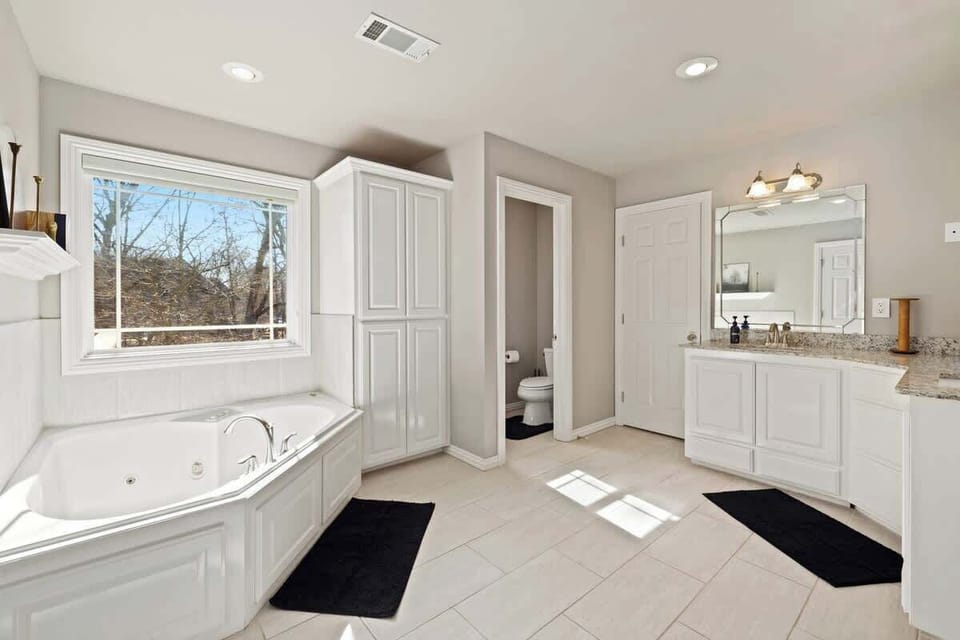 Pictured is our second jacuzzi tub, perfect for unwinding at the end of a fun-filled day!