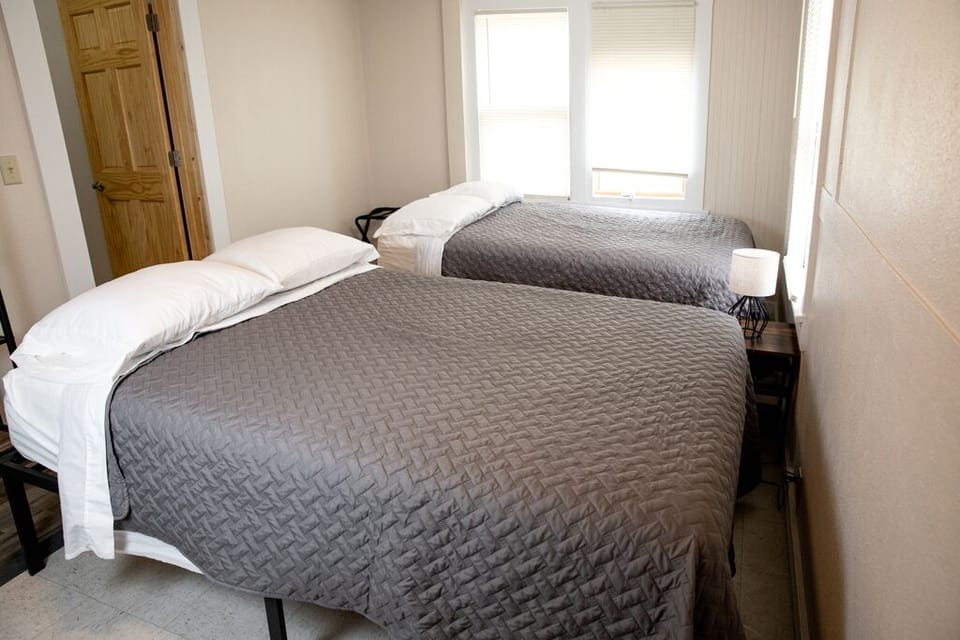 Bedroom with 2 queen beds.