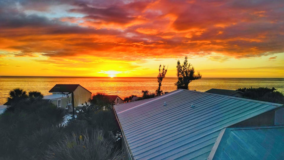 Magnificent sunsets over the Gulf of Mexico are just 50 steps away.