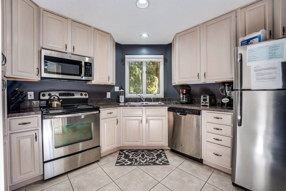 Great Kitchen: Whip up meals with modern appliances and natural light streaming in!