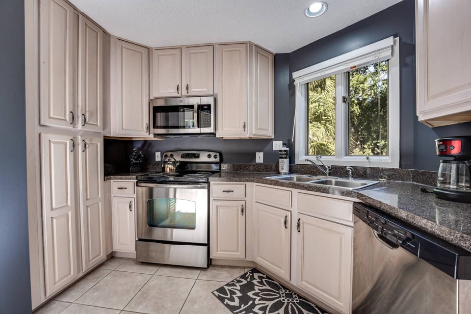 Lots of pantry storage - full kitchen with stainless steel appliances including dishwasher   Drip Coffee Maker