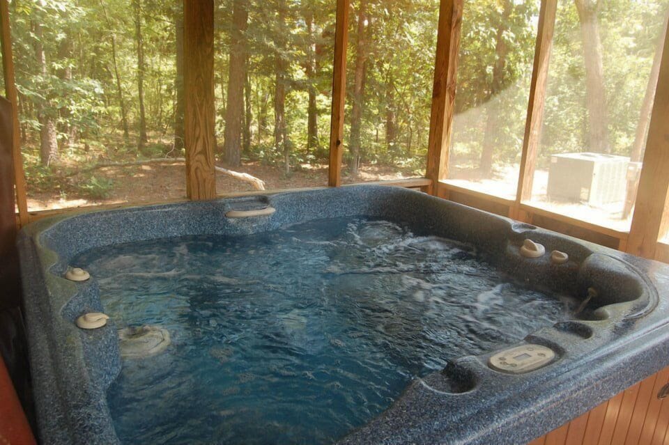 Unwind in the bubbling spa and let the forest set the mood