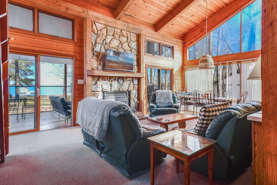 Living room with plenty of seating, Smart TV and access to screen room.