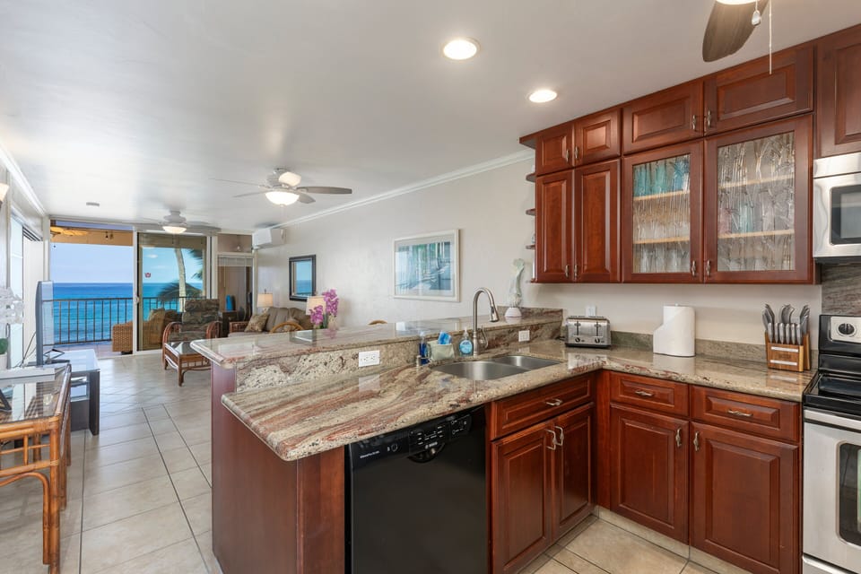 In the kitchen does not mean you are cut off from the ocean action nor will you miss the sunset.