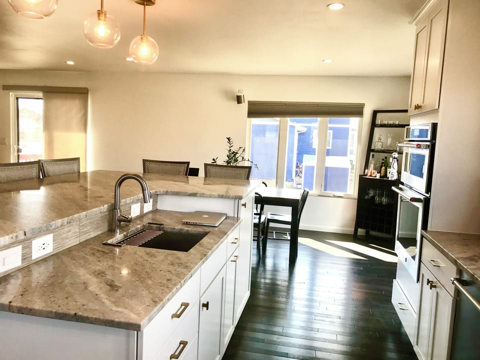 Large island with second sink and seating for 6.