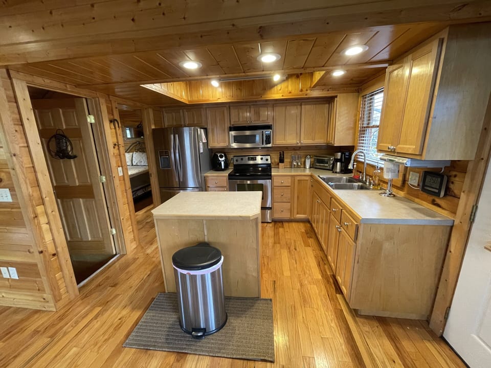 Full kitchen, electric stove, coffee maker, air fryer, dishes, etc. like home