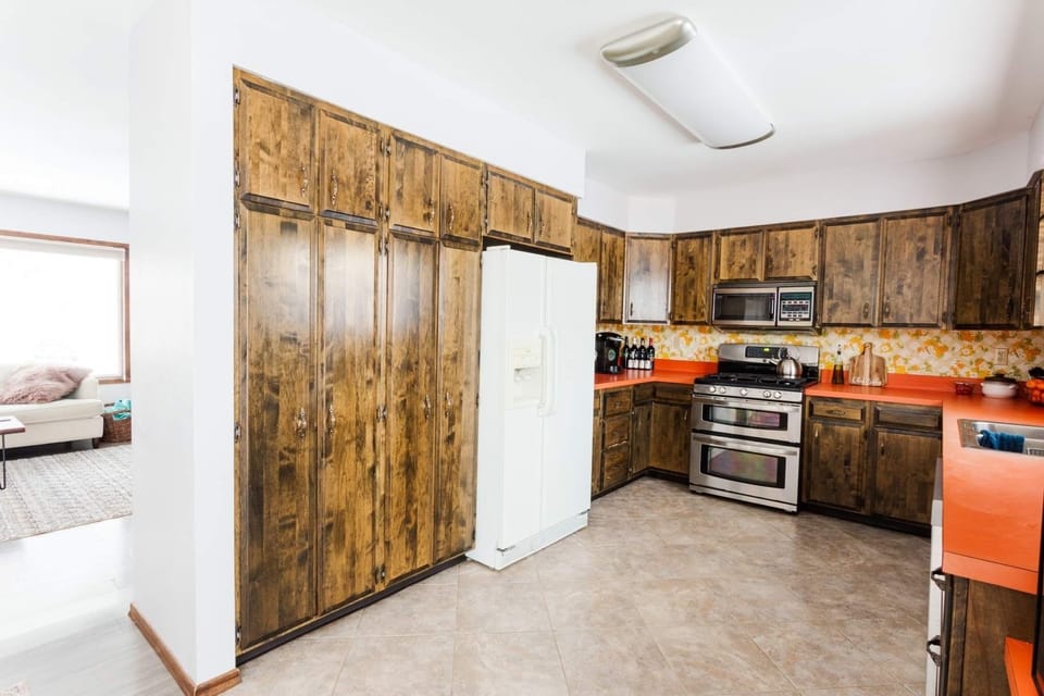 Large kitchen with double oven.