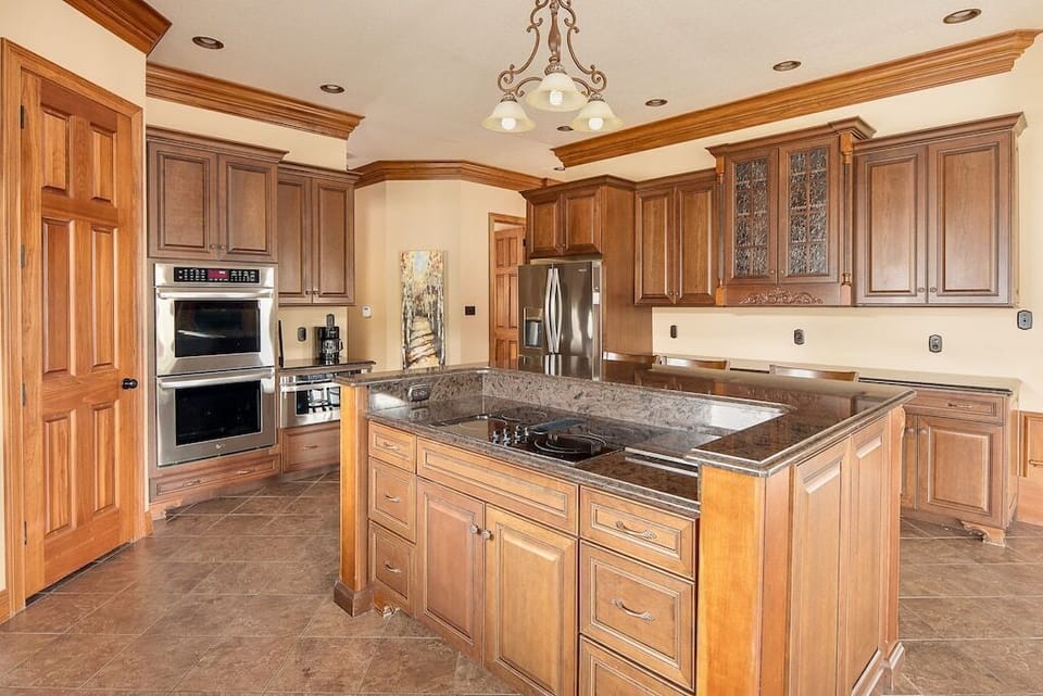 Fully equipped w/ frig, range top, dual wall ovens, microwave, coffee makers....