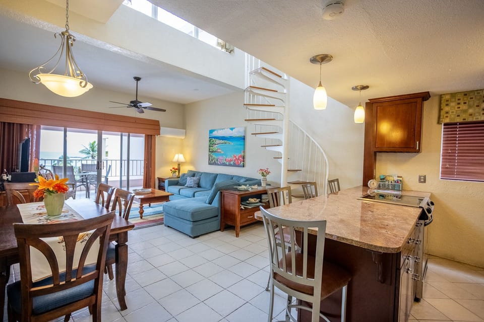 Living Room, Dining Table and Patio. Ocean View from Kitchen. 
