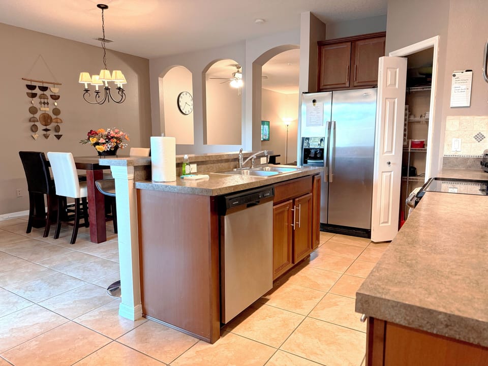 Open kitchen with breakfast counter