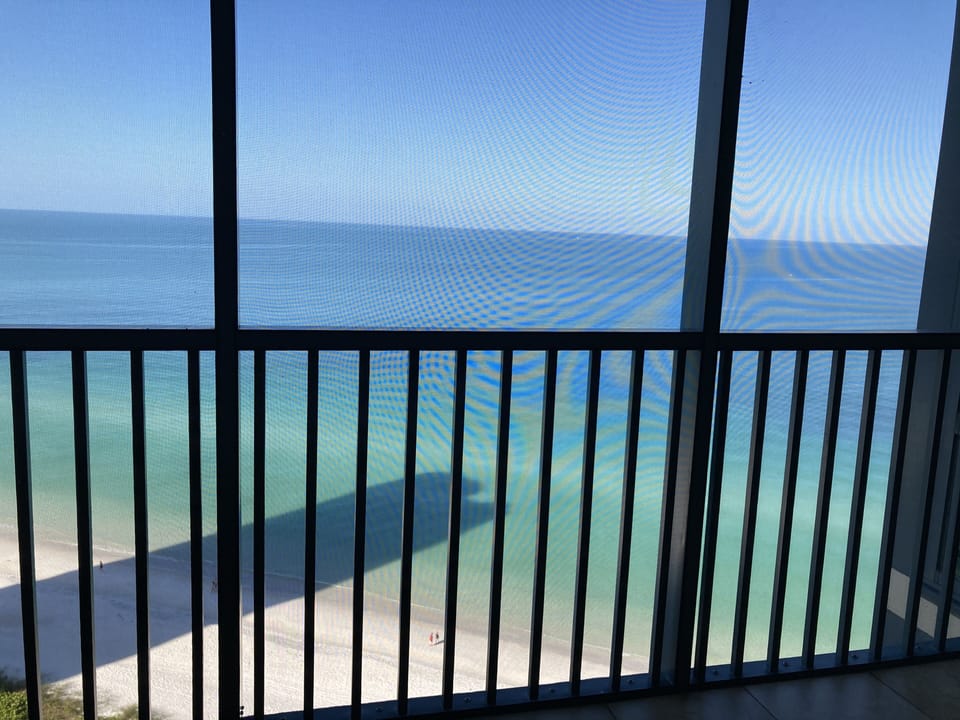 Mesh covered balcony. No mosquitos.Amazing place to relax and entertain 