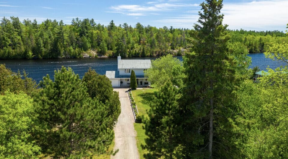 Long driveway with garage and lots of parking 