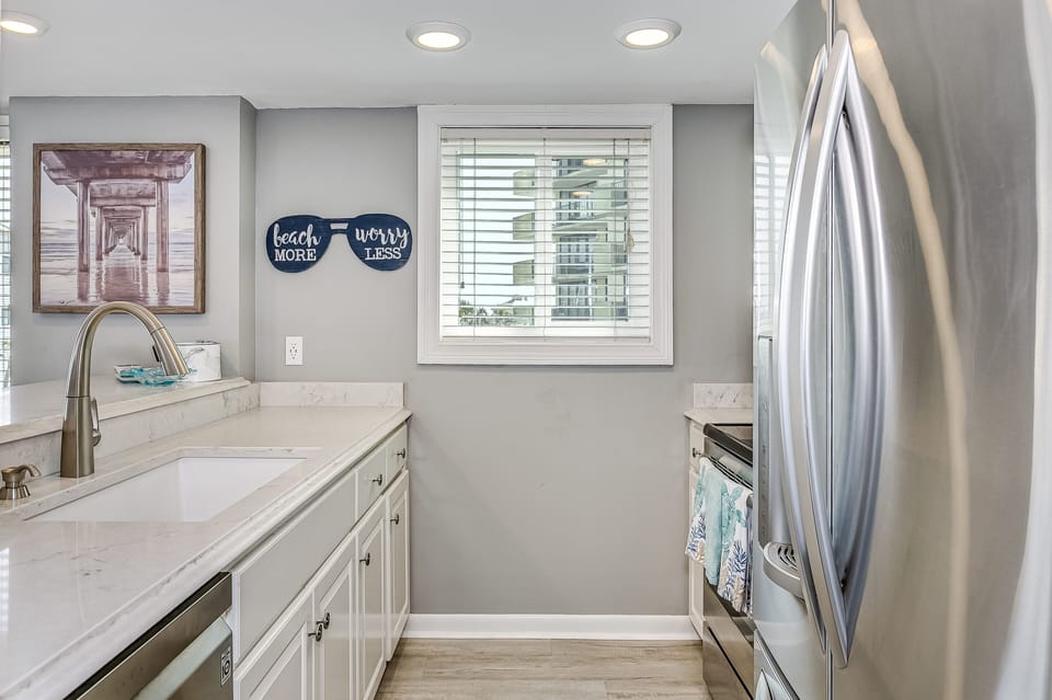 Updated kitchen with stainless steel appliances & beautiful granite countertops.