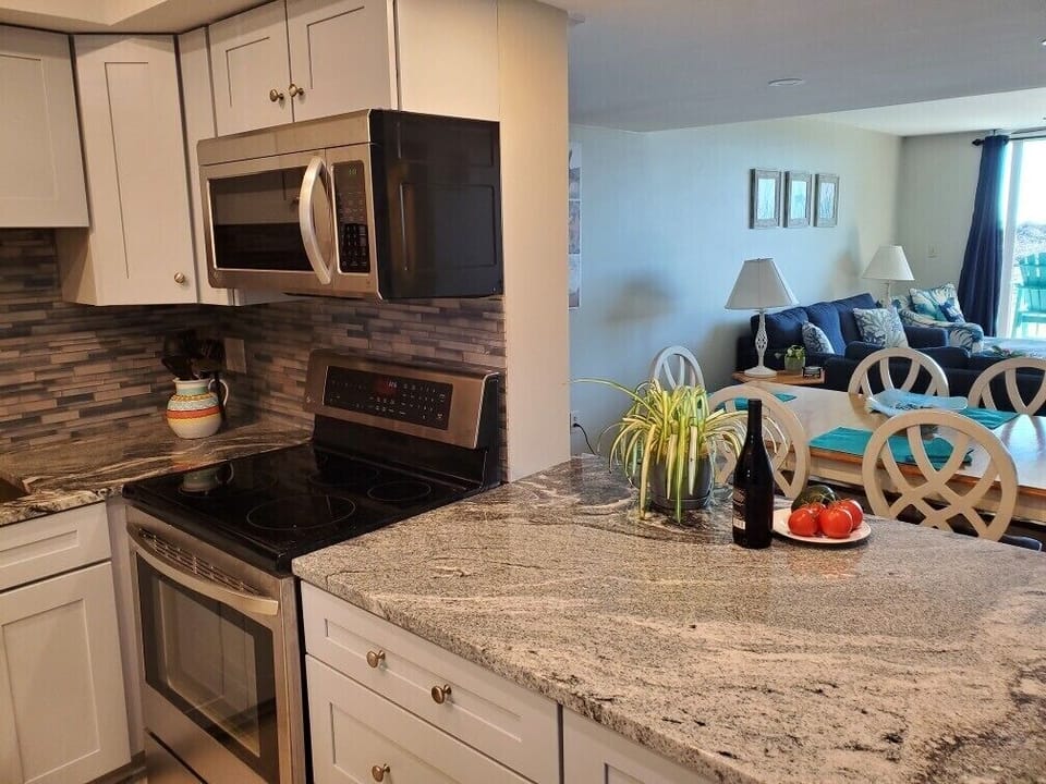 Beautiful new granite, backsplash and cabinets. 