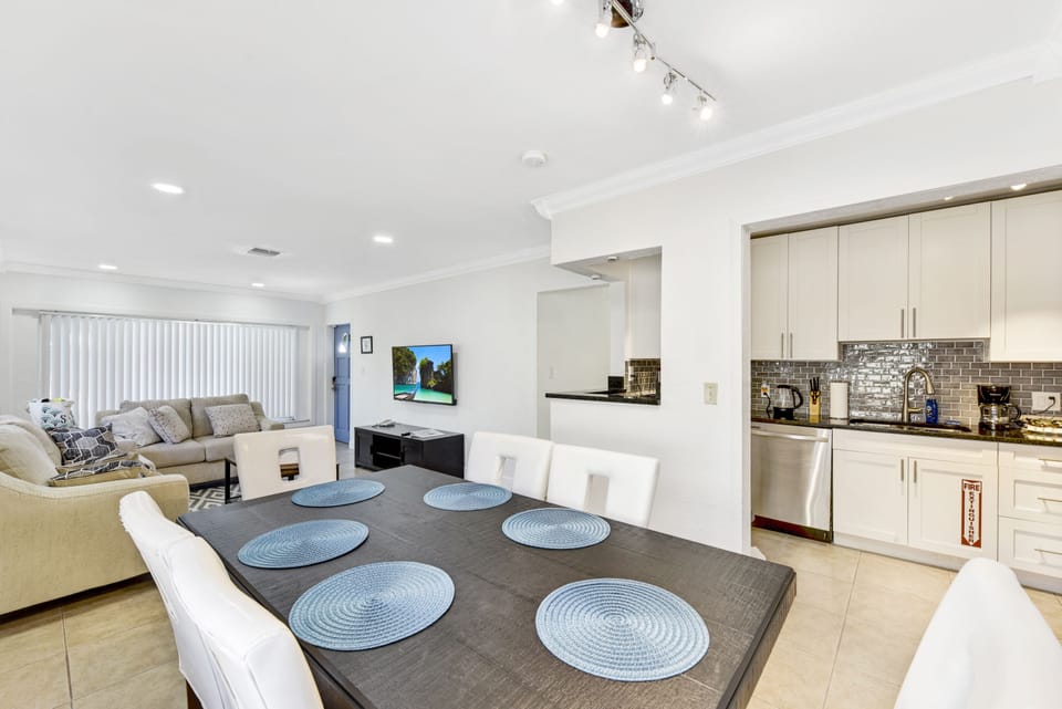 Dining Room that sits 6 people comfortably .