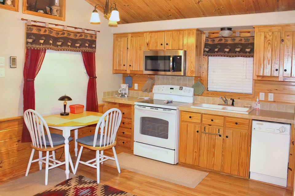 Kitchen w/ Full-size Refrigerator, Stove, Microwave & Dishwasher 