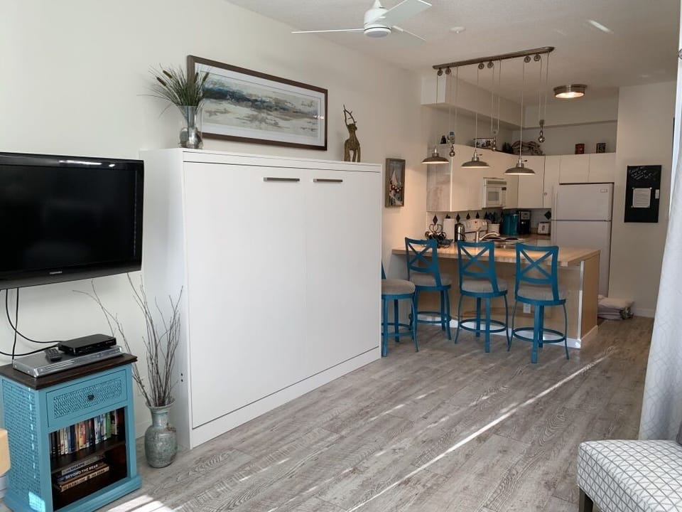 View of Queen Bed towards Kitchen