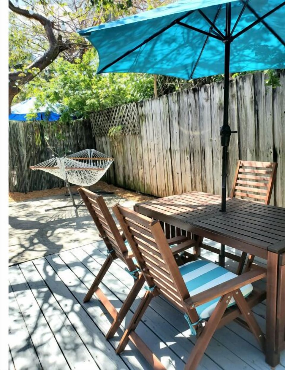 Enjoy a backyard BBQ or a nap in the hammock!