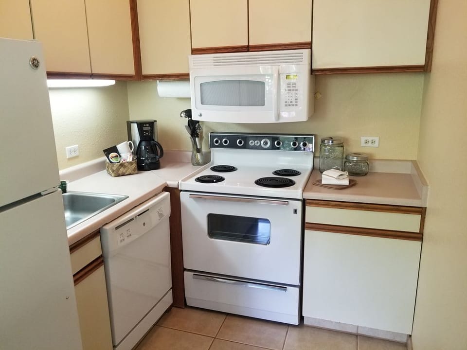 Full size fridge, range, microwave and dishwasher.
