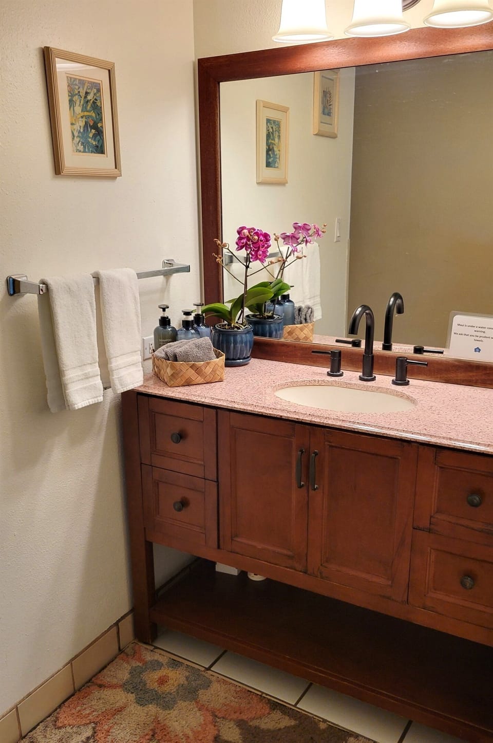 The bathroom has a separate vanity for conenience.