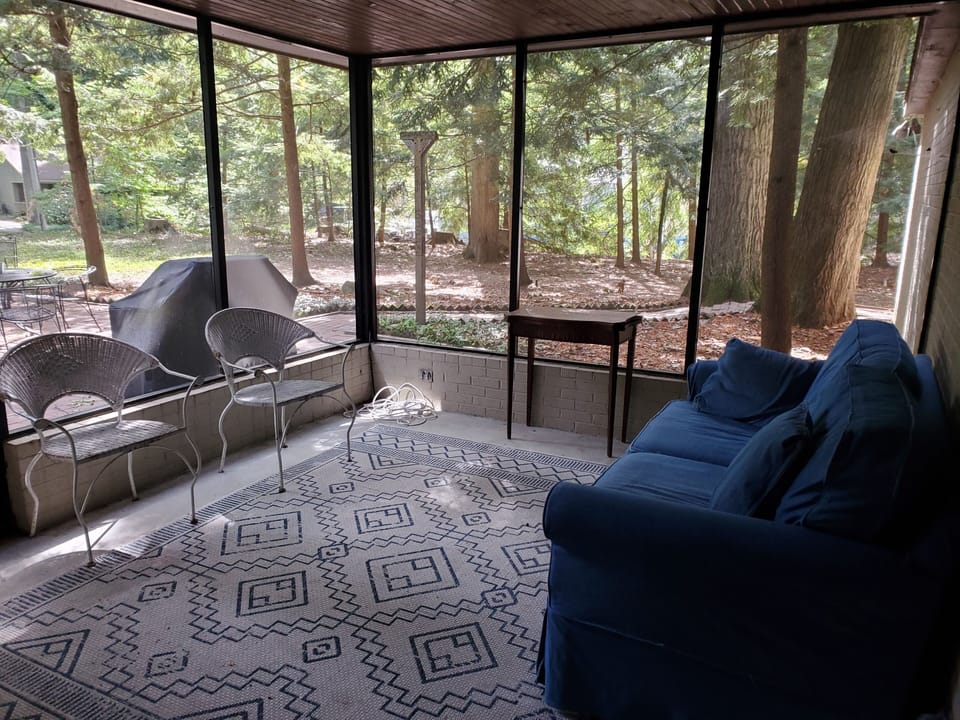 Screened porch overlooking patio & backyard - beautiful any time of day/night