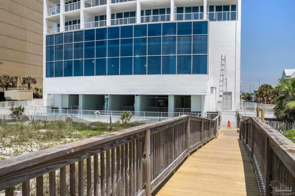 Board walk, swimming pool, covered seating area, new chaise loungers!
