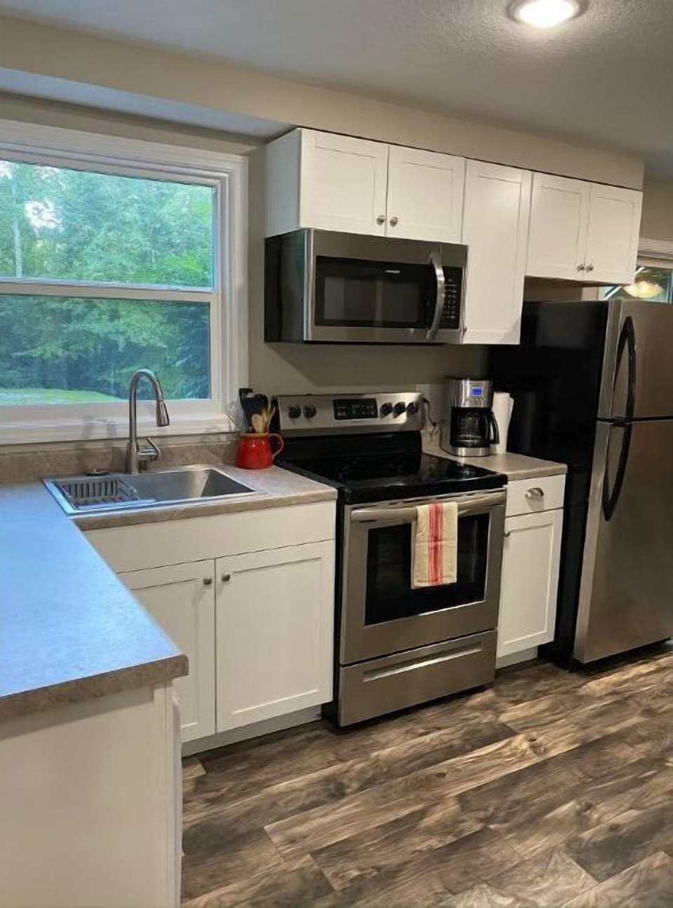 Kitchen with views to the spacious natural yard