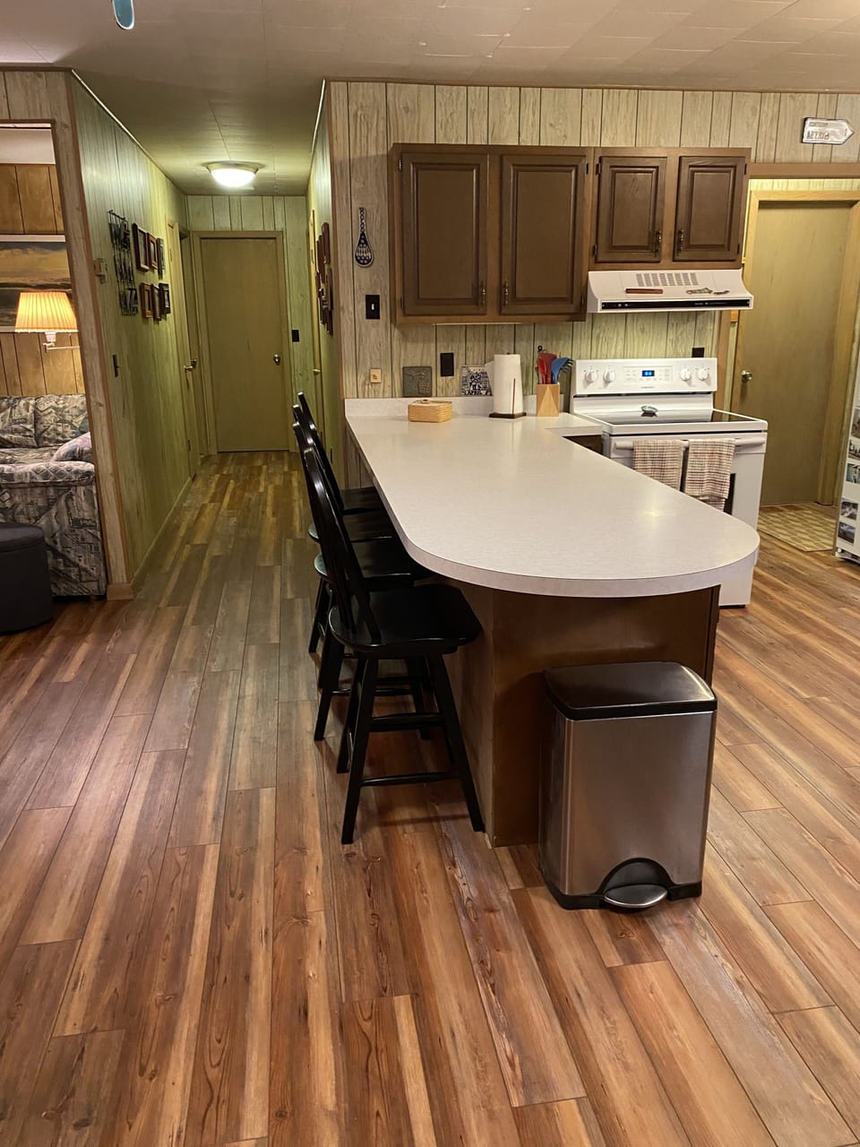 Inside cottage by lake kitchen and hall