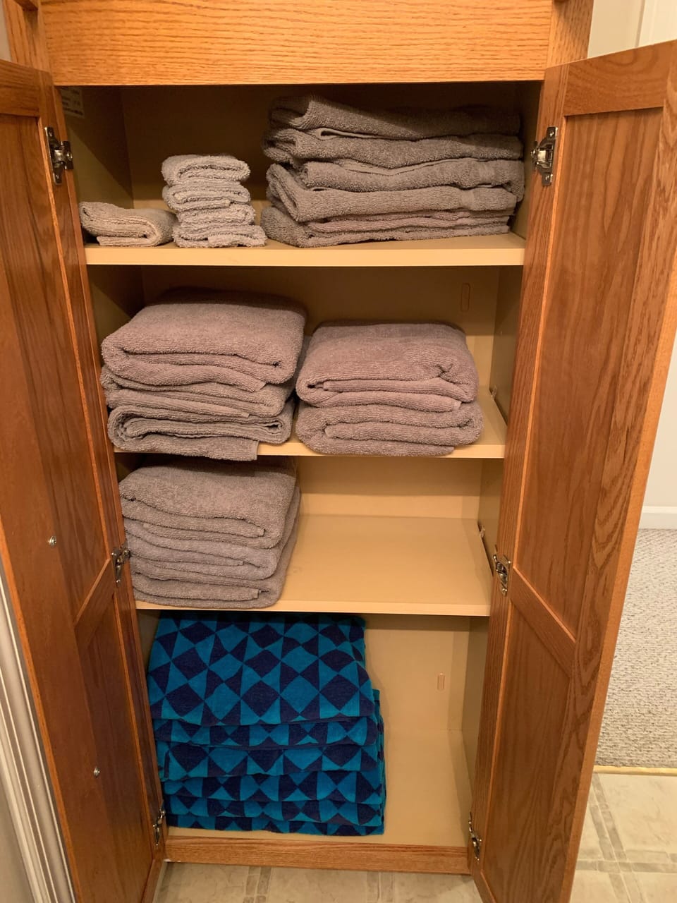 Hall Bath Linen Closet.  With Pool/Water Park/River Towels available for use. 