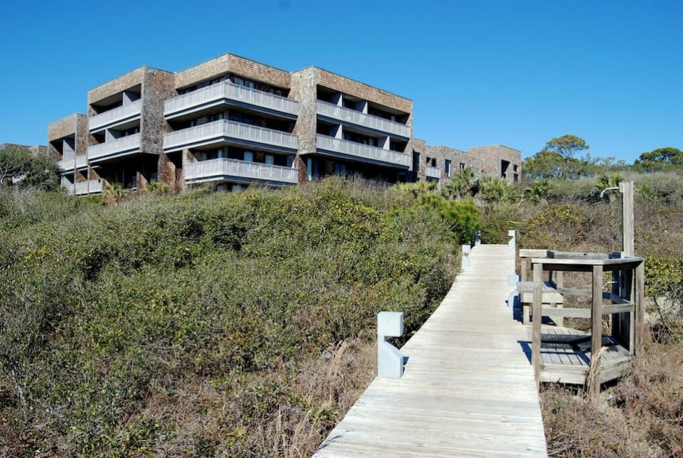 Beach access steps from the back door of the villa. 