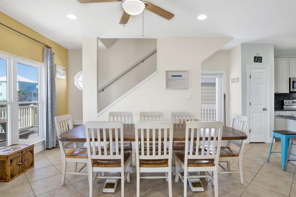 Open dining area, table seats 8