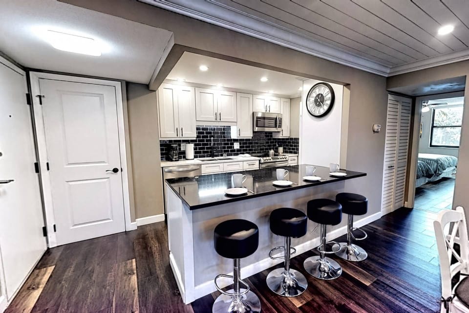 Beautifully renovated granite and stainless kitchen.  Stocked with dishes and stemware, ready for your family!