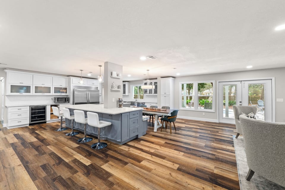 Spacious Kitchen with Large Island, Beautiful Granite Countertops, Stainless Steel Appliances, Two Dishwashers, Double Oven, Double Refrigerator, Coffee Bar and Sitting Area with Flat Screen TV