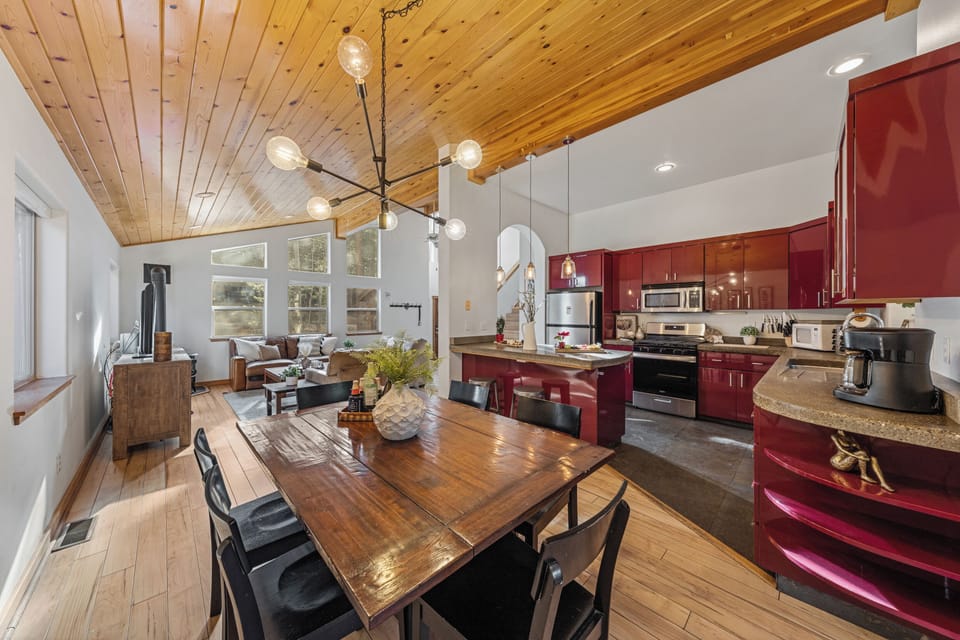 Gather around the dining table or enjoy casual meals at the kitchen bar.