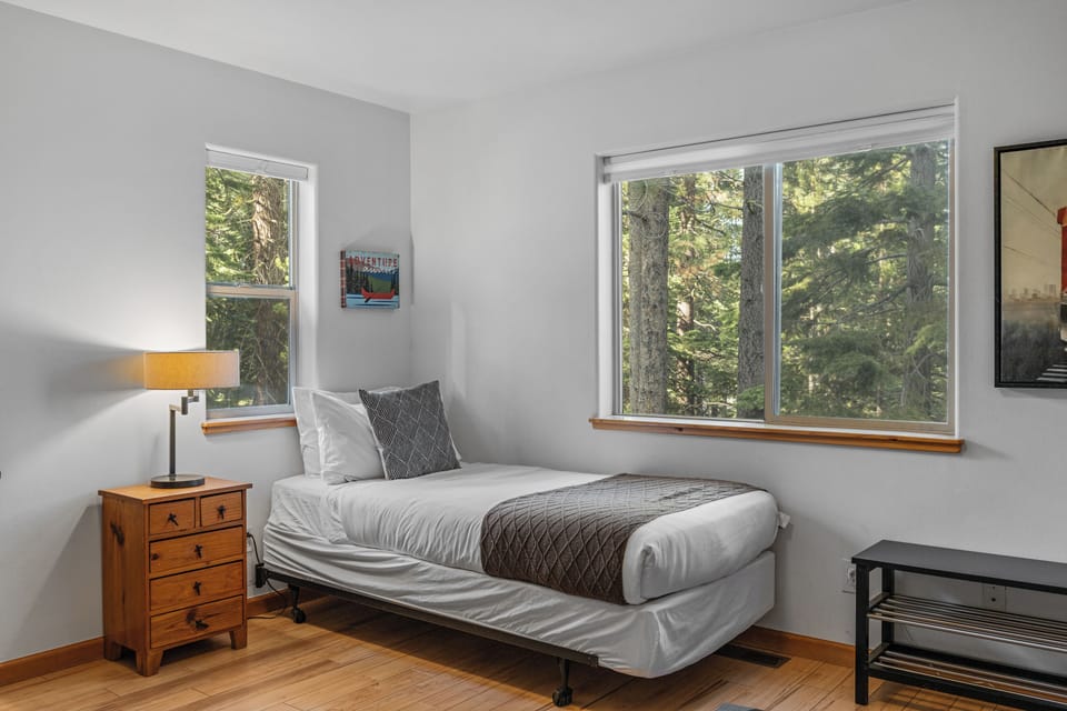Bedroom 3 features a twin over full bunk bed and a twin bed.