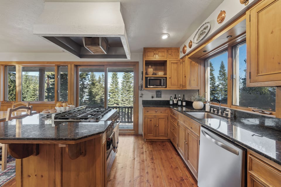Gather in the heart of the home—an inviting kitchen with a generous island and rustic Tahoe charm.