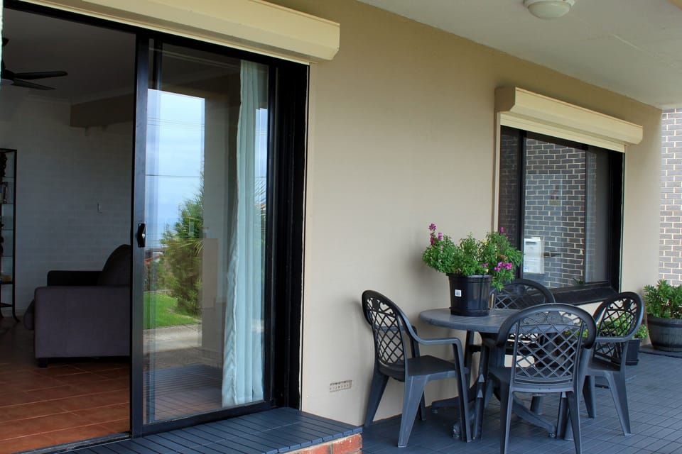 Sit on the front patio with a drink or a coffee and watch the world go by