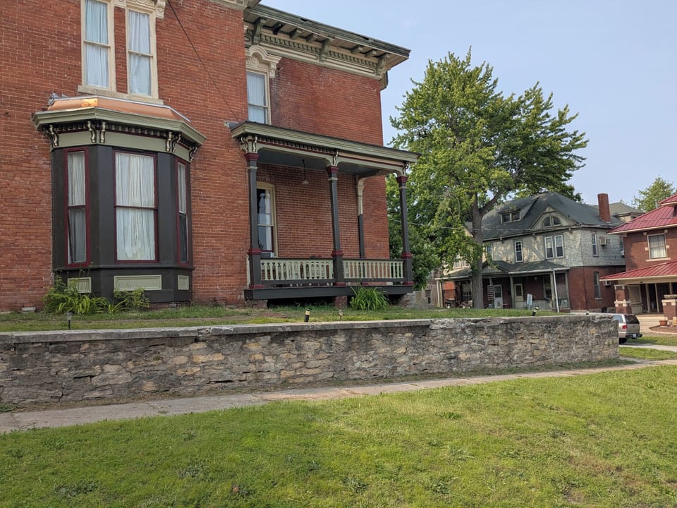 Admiral Fuqua House is an Italianate home built in 1879. Hill Street elevation.