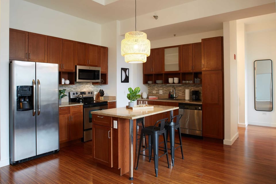 Fully stocked kitchen with large granite island