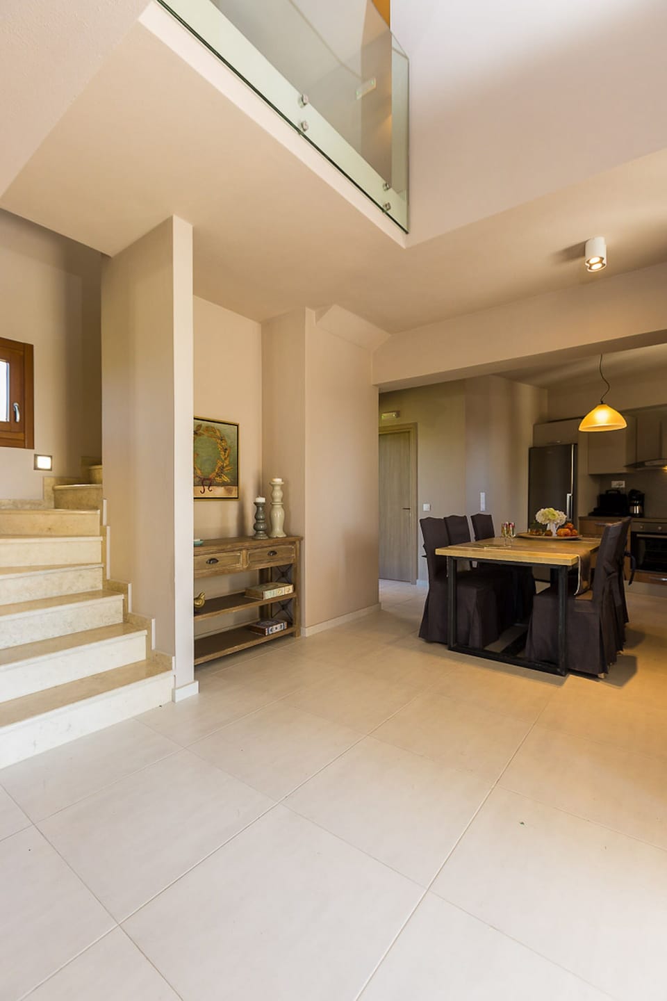 The stairs leading to the upper floor, adding elegance to the space.