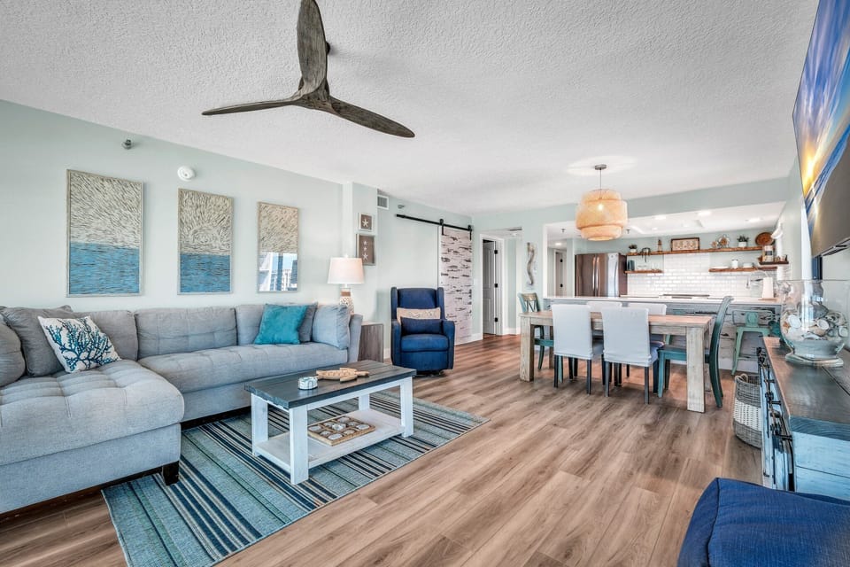 Well appointed living room with serene blue decor